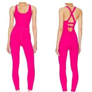 FP Movement by Free People Happiness Runs Onesie in Punch Crush Pink Romper